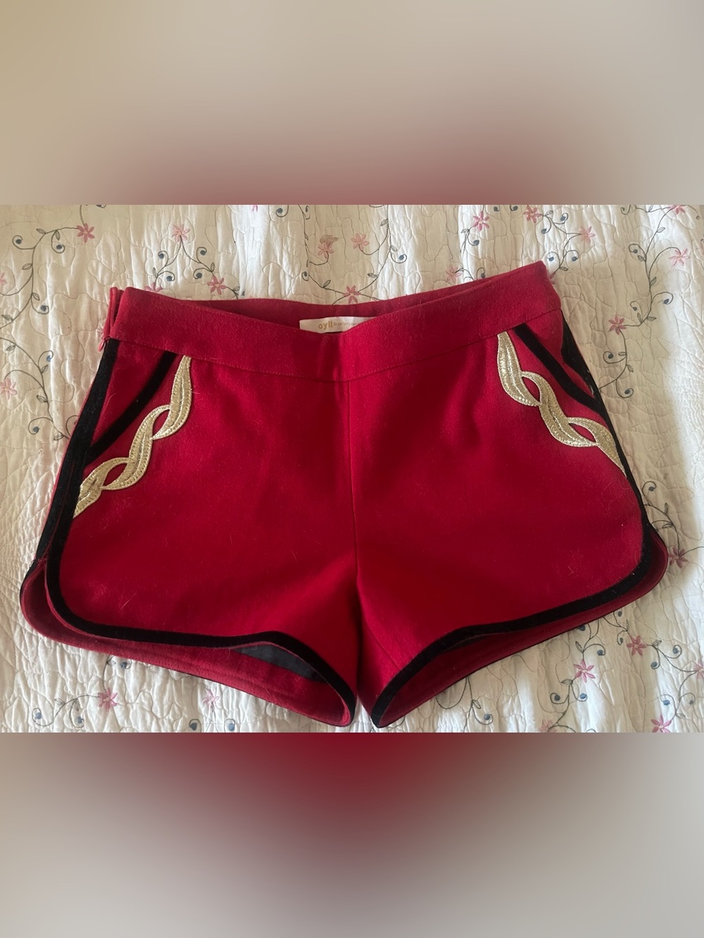 Red Athletic Shorts with Gold Trim and Black Piping